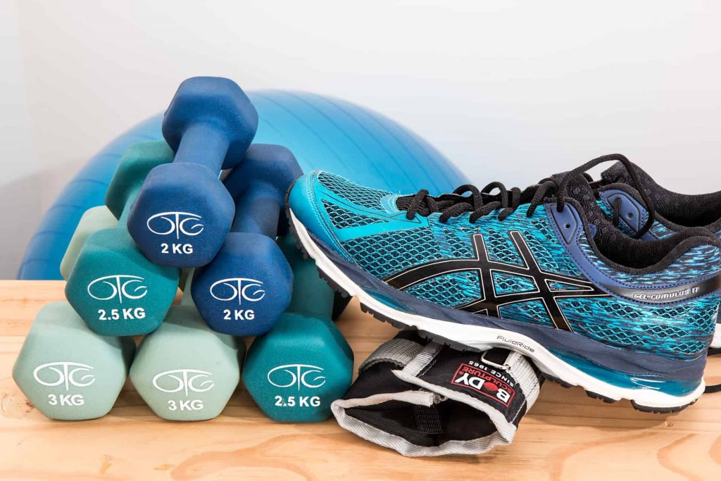 weights, sneakers and yoga ball