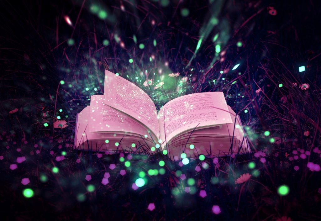 photo of sparkles coming out of book