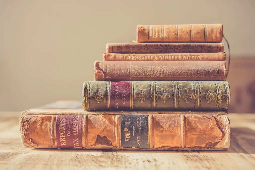 stack of very old crumbly books