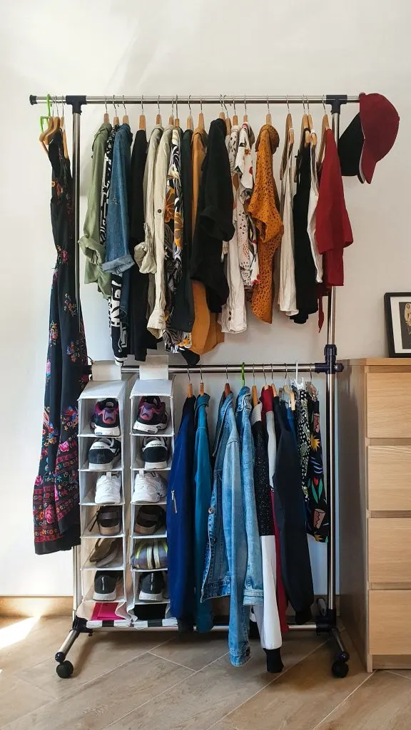 clothes storage rack with clothing