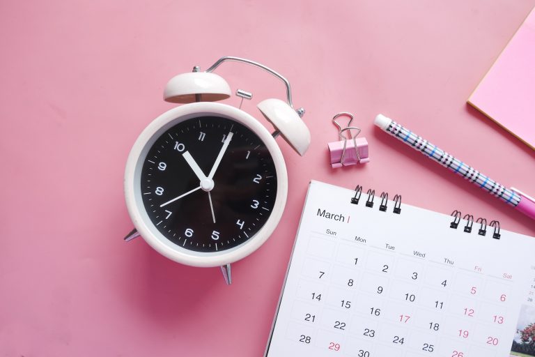 monthly calendar with clock