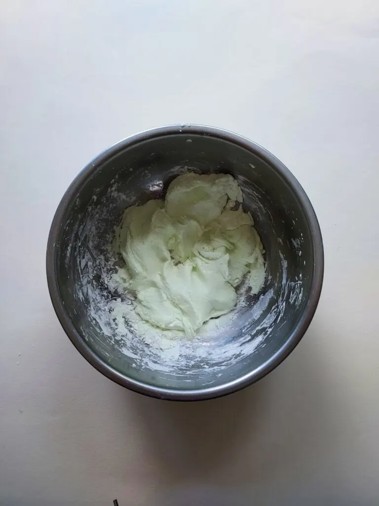 metal mixing bowl with mixed white homemade slime