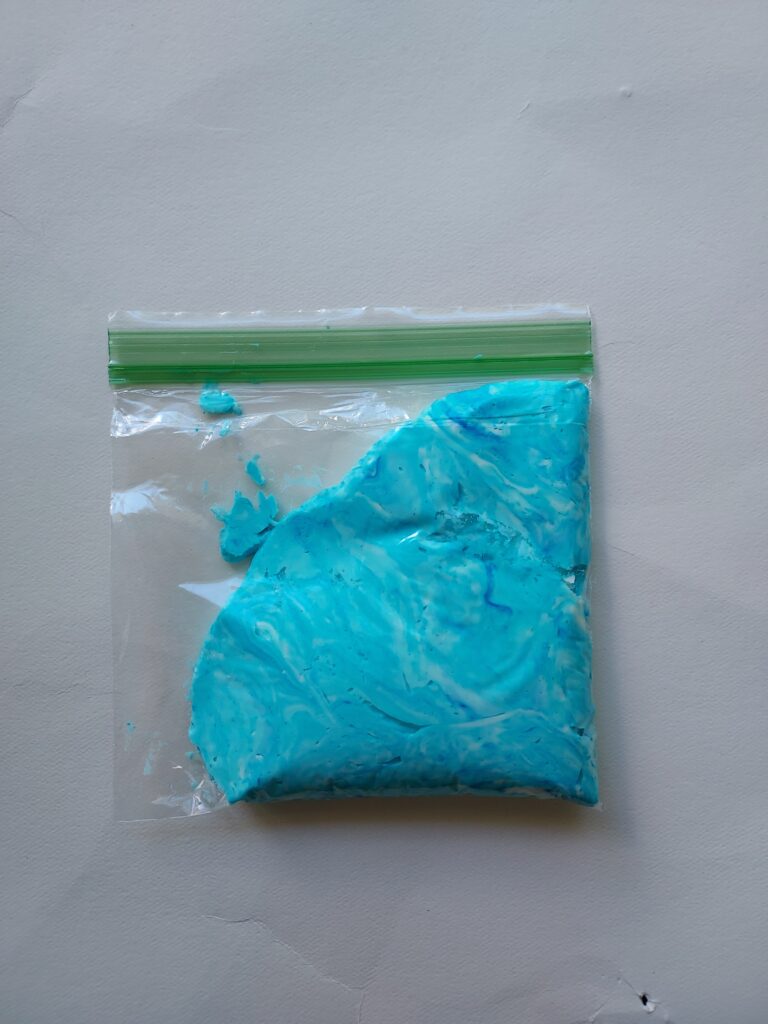 zip lock sandwich bag filled with blue slime
