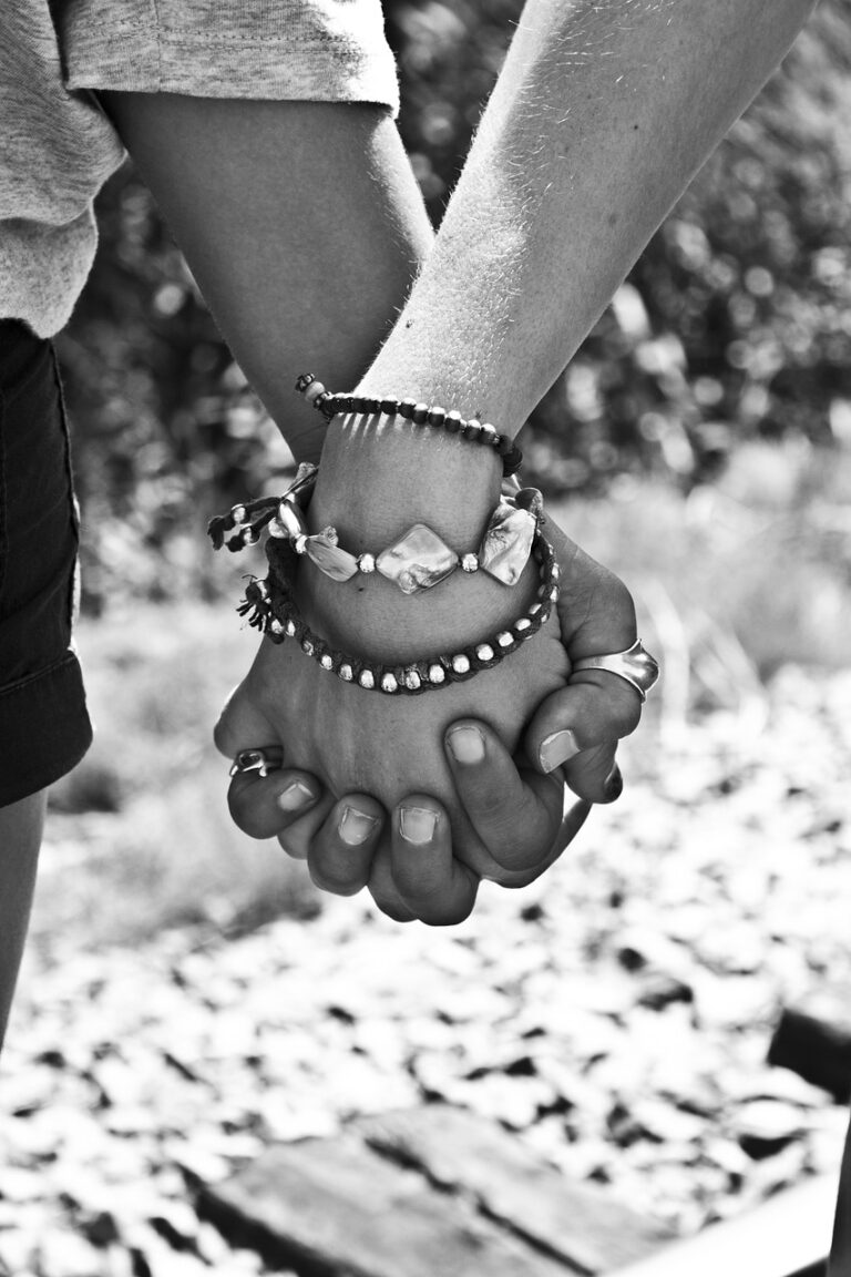 Date Ideas for Teens, black and white photo of holding hands