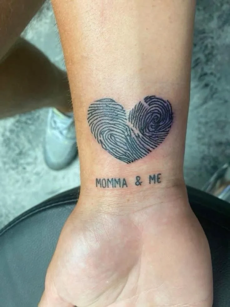 tattooed fingerprints make a whole heart momma and me