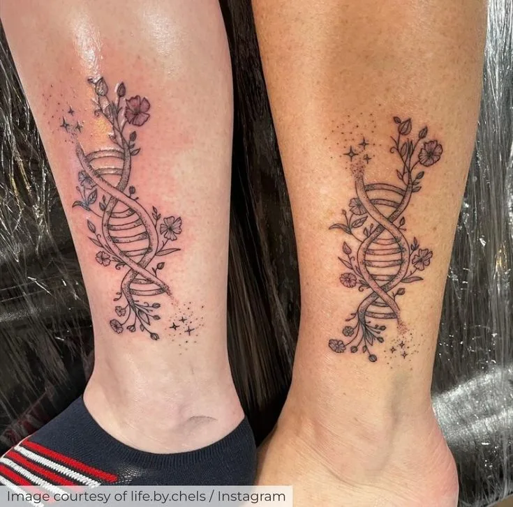 DNA helix tattoo with flowers entertwining