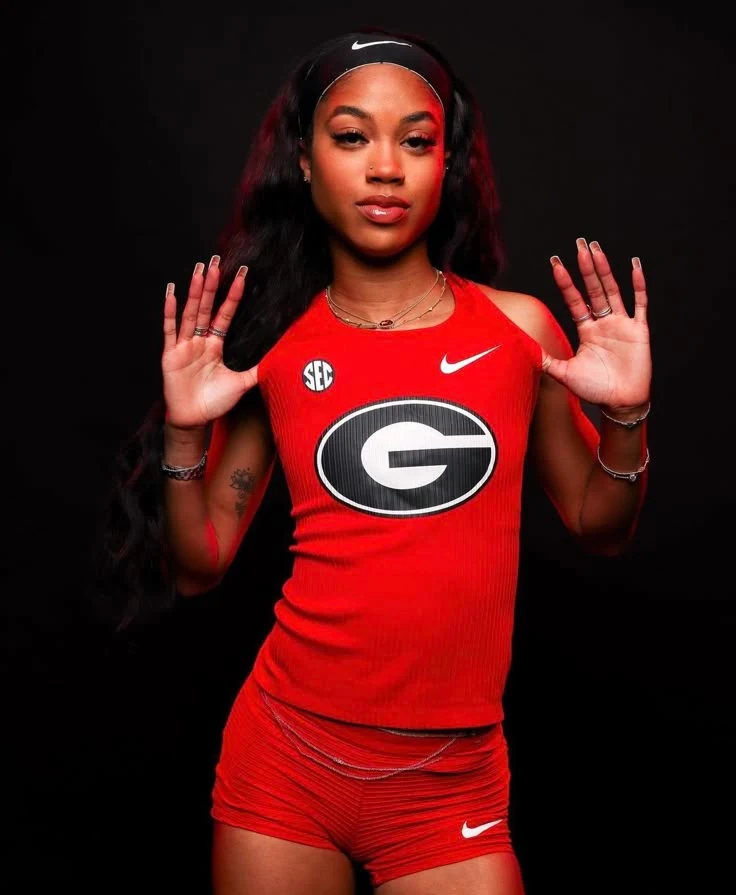 media poses track and field